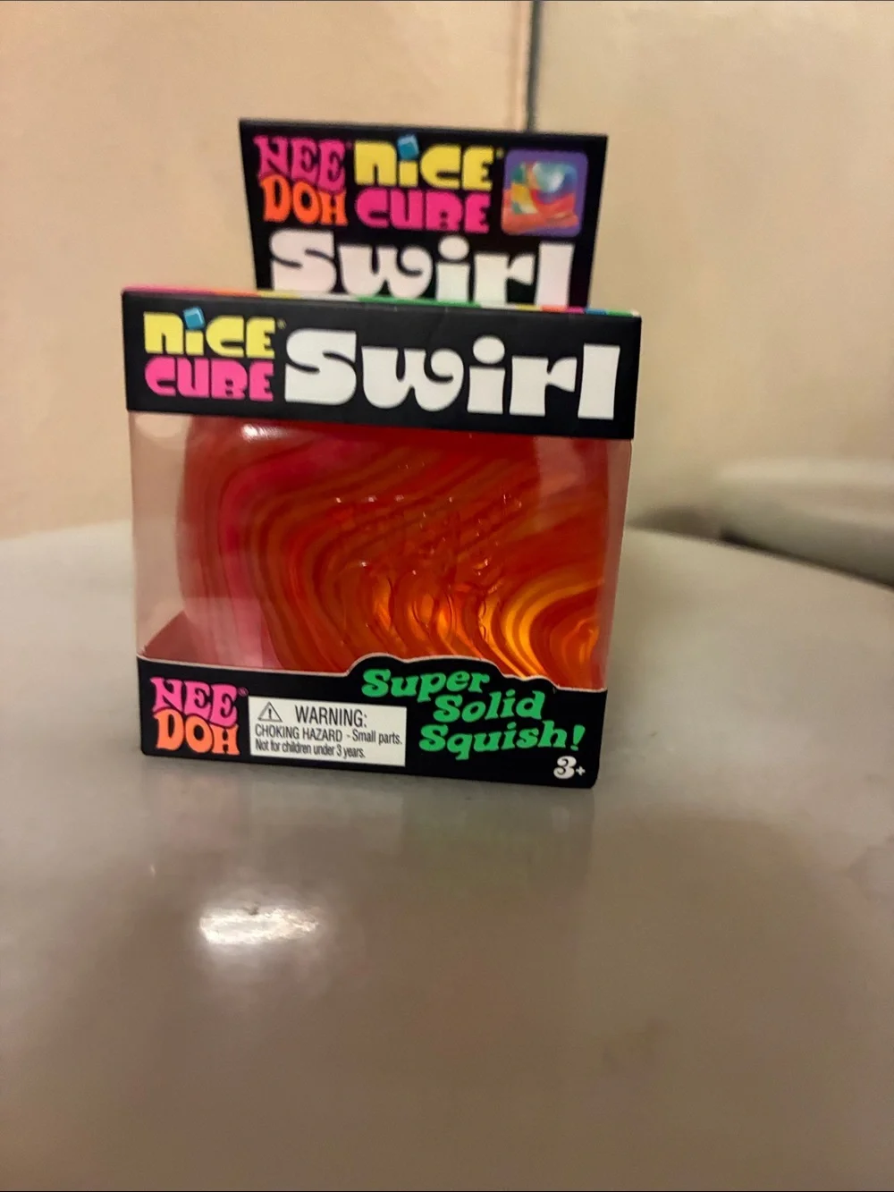 NeeDoh Nice Cube Swirl Super Solid Squish! Orange Swirl